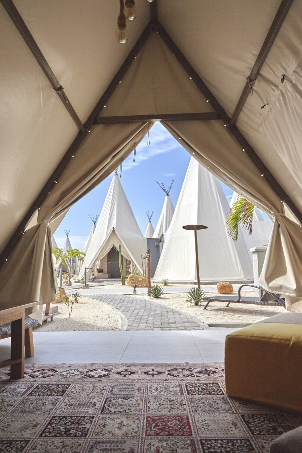 Guest tent interior at The ANMON Resort Bintan glamping park