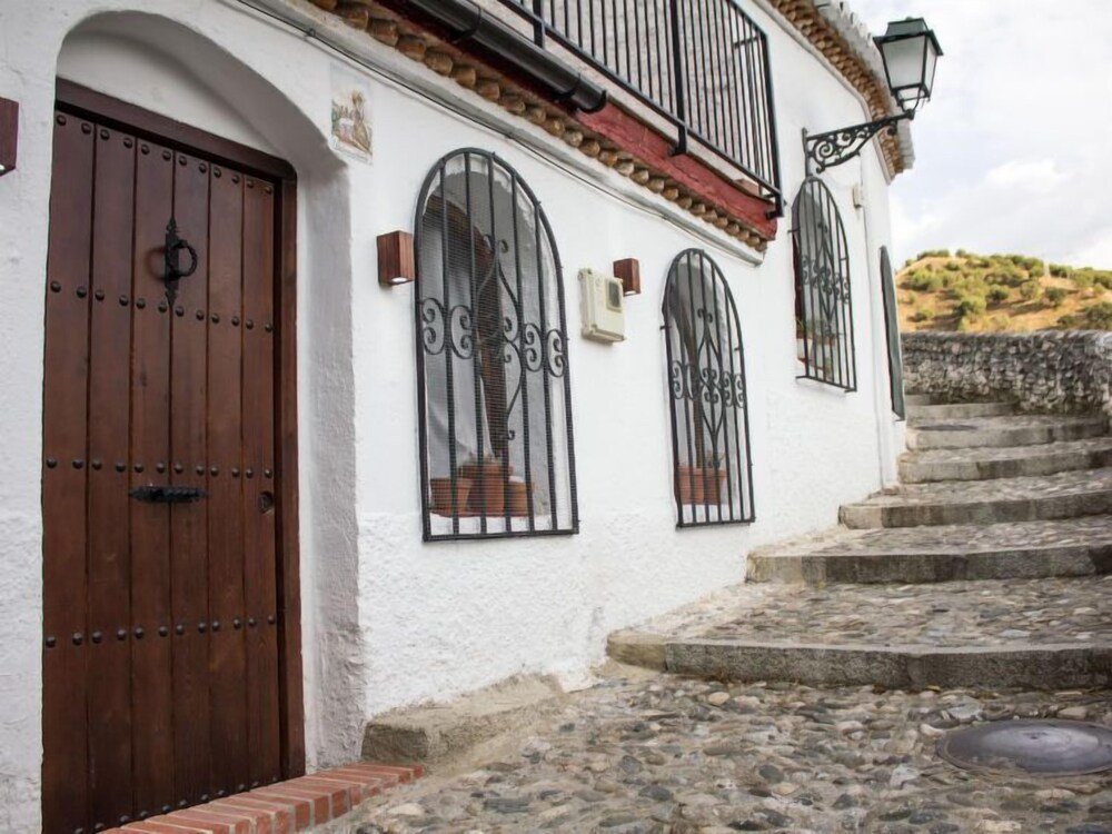 Private terrace with garden furniture at Cueva de Lindaraja